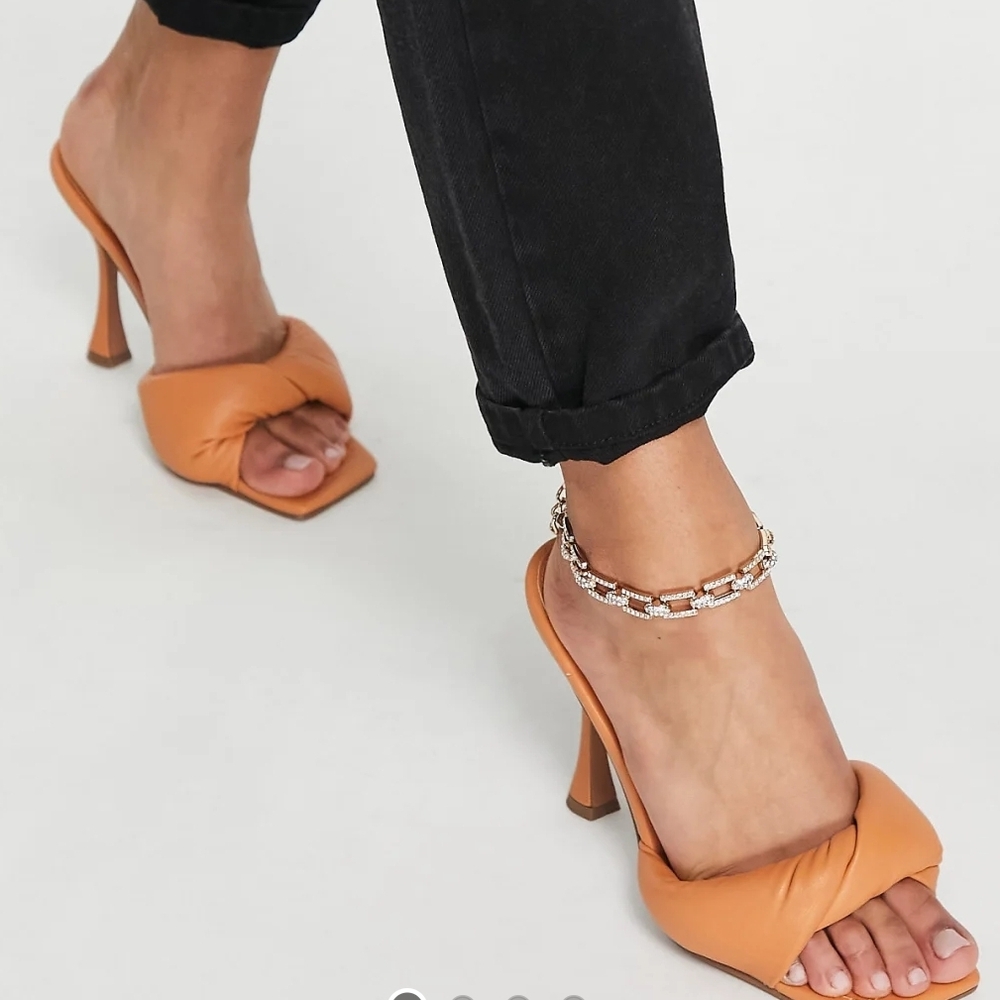 ASOS Design Niki padded twist high heeled Mules in beige/tan